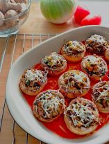 Champiñones rellenos de espinaca y piñón